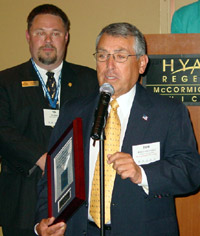 Robert Ontiveros of Group O accepts ICCTA's 2005 Business/Industry Partnership Award.
